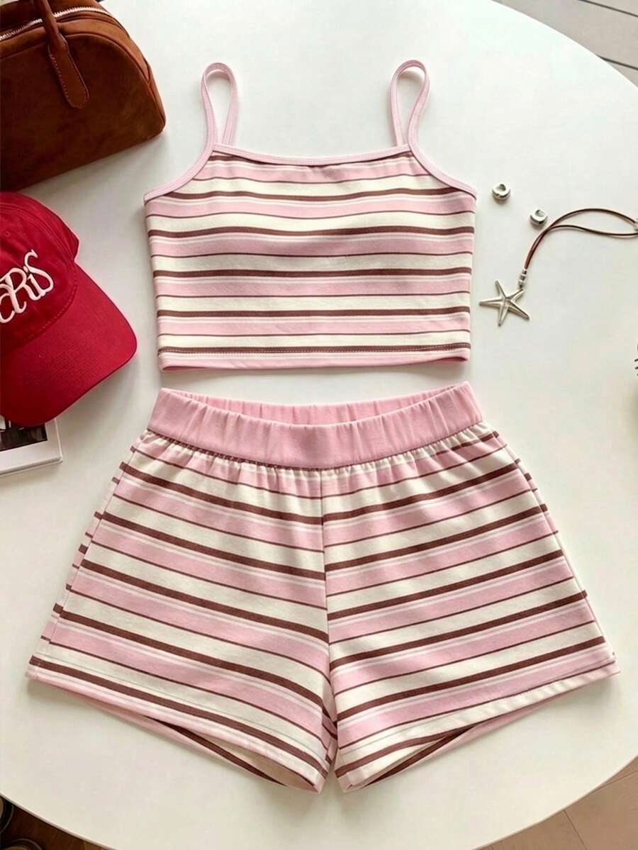 Tween girls summer 2-piece Hawaiian style outfit featuring a graphic print spaghetti strap camisole top with contrast piping and matching casual shorts.