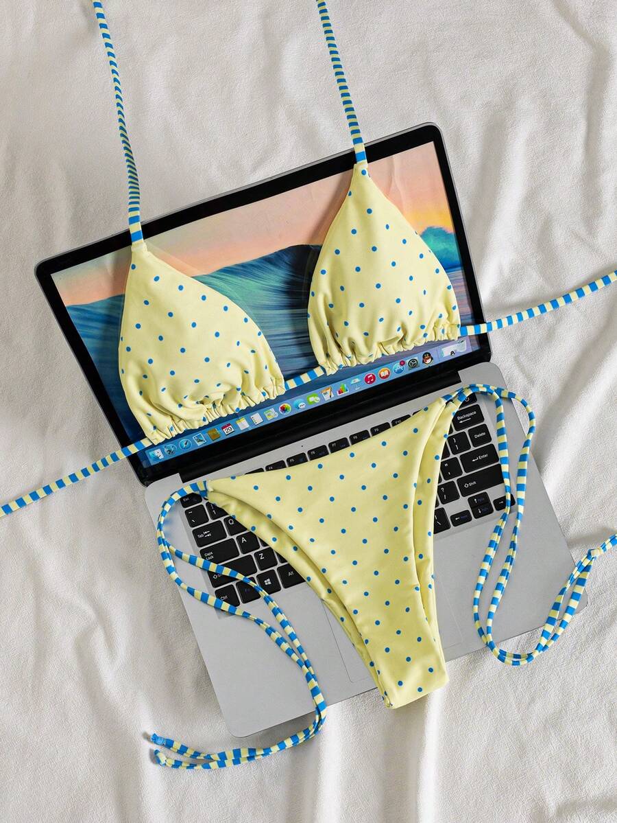 Multicolor striped halter neck two-piece bikini set featuring wireless triangle cups and low-waist tie-side bottoms.