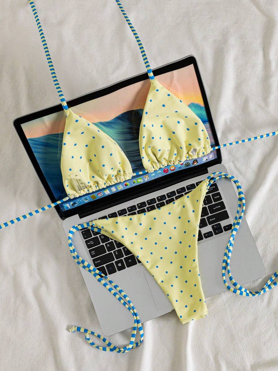 Multicolor striped halter neck two-piece bikini set featuring wireless triangle cups and low-waist tie-side bottoms.