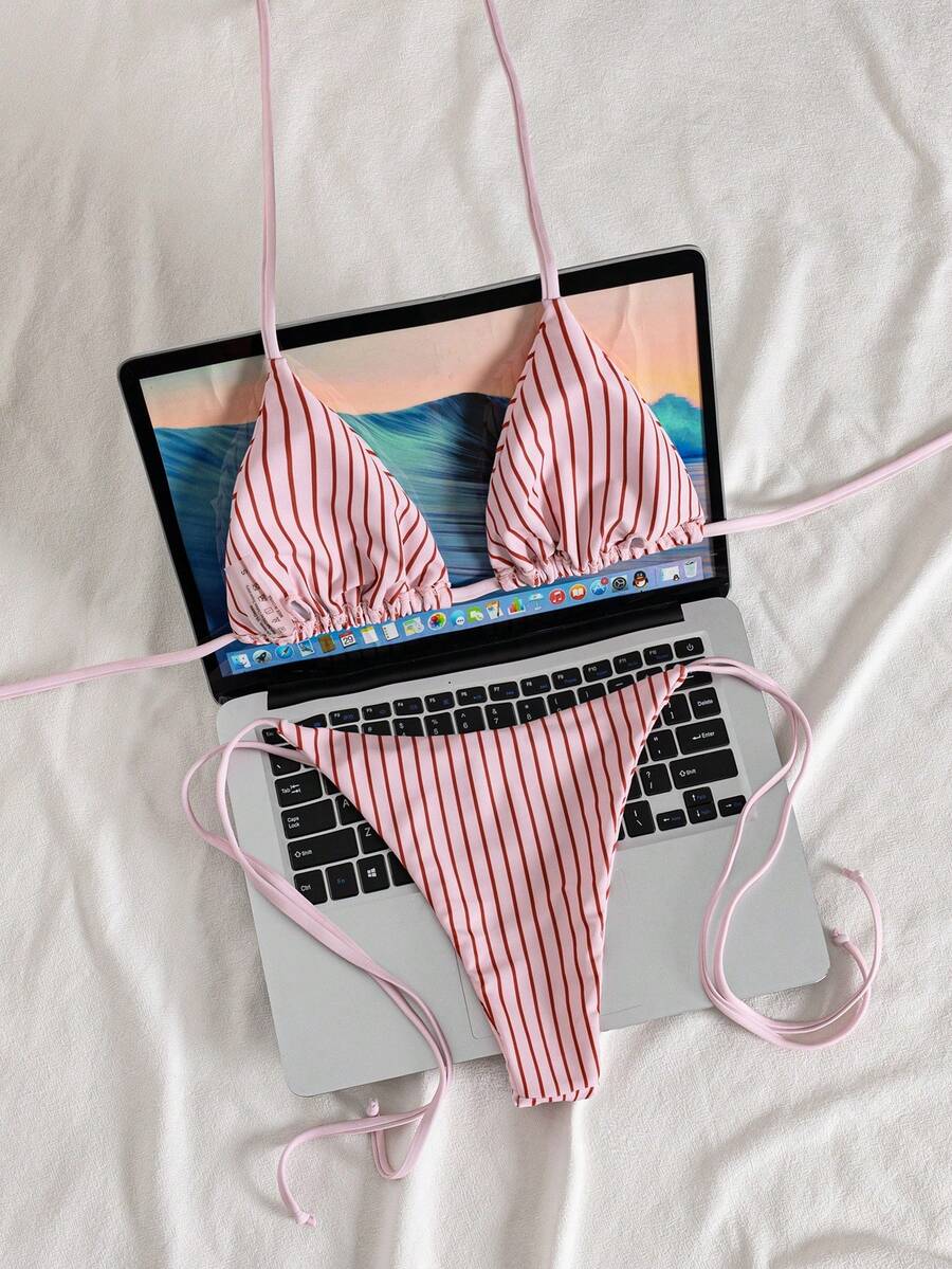 Multicolor striped halter neck two-piece bikini set featuring wireless triangle cups and low-waist tie-side bottoms.
