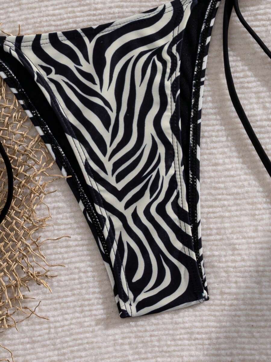 Women's 2-piece halter bikini set featuring geometric print, triangle cups with removable padding, and side tie bikini bottoms