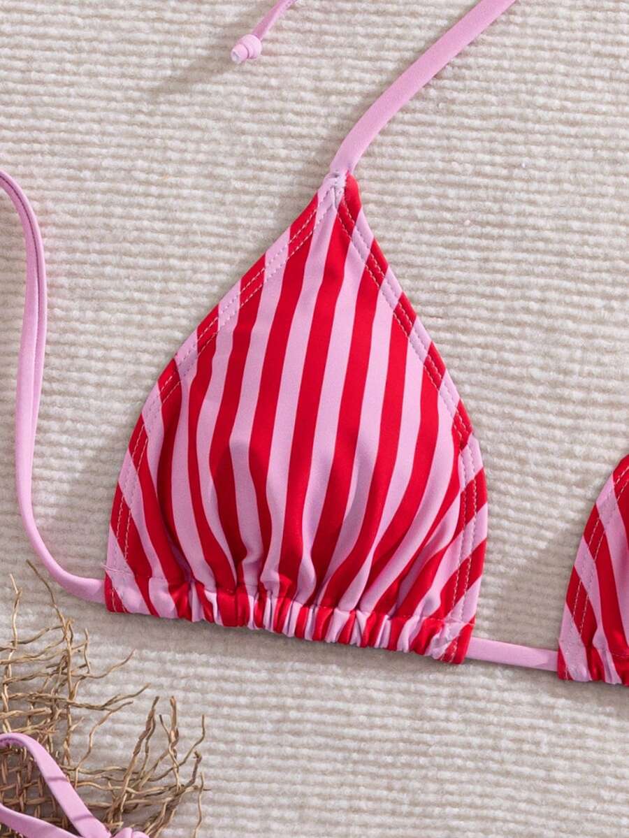 Women's 2-piece halter bikini set featuring geometric print, triangle cups with removable padding, and side tie bikini bottoms