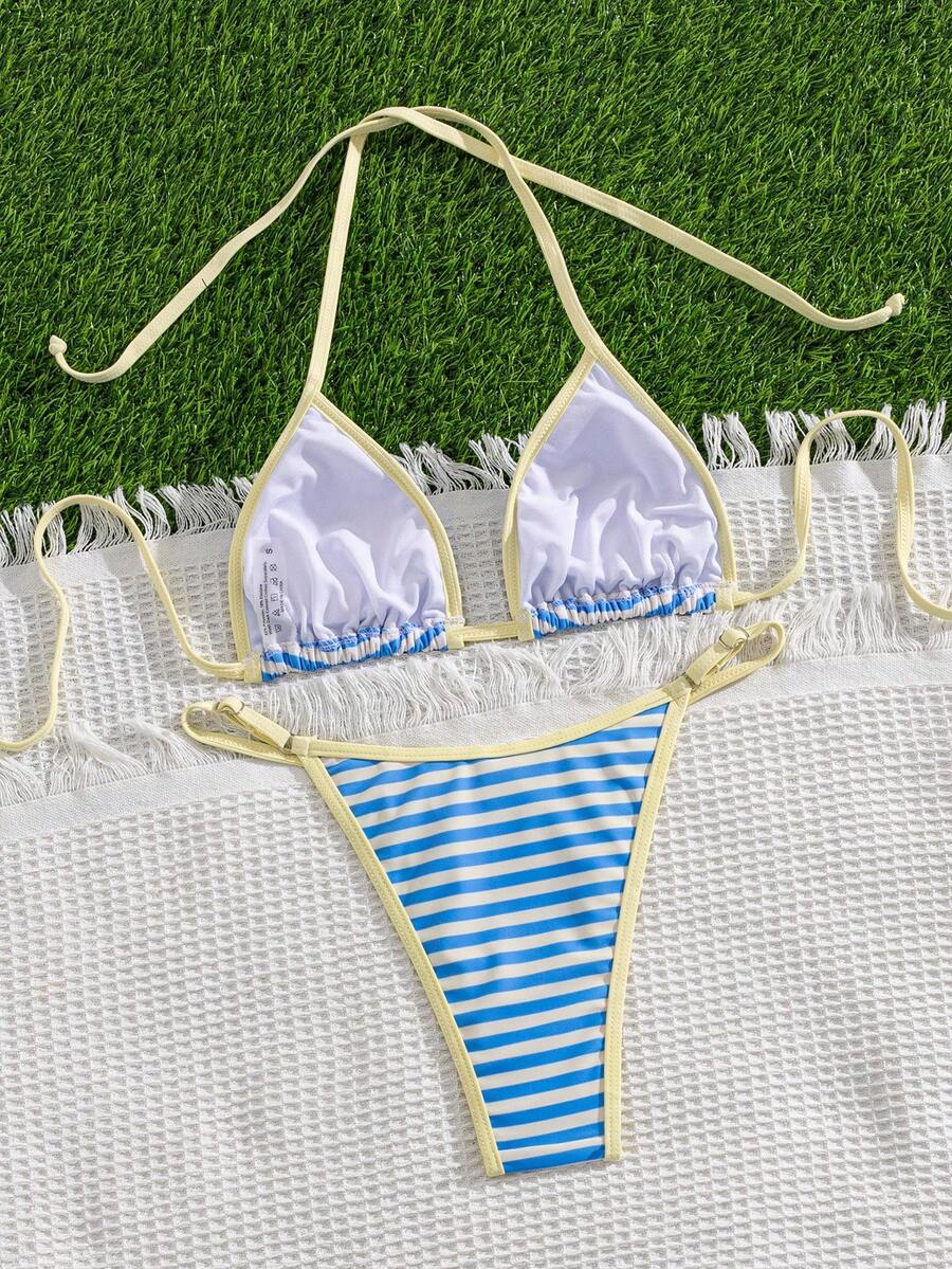 Multicolor bohemian bikini set for women featuring a backless halter top with knot details and high cut swimsuit bottoms.