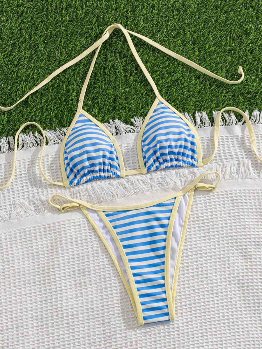 Multicolor bohemian bikini set for women featuring a backless halter top with knot details and high cut swimsuit bottoms.