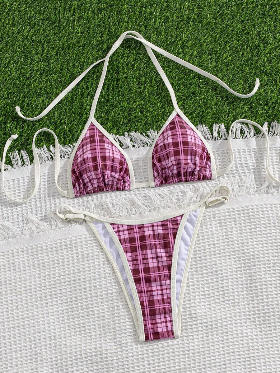 Multicolor bohemian bikini set for women featuring a backless halter top with knot details and high cut swimsuit bottoms.