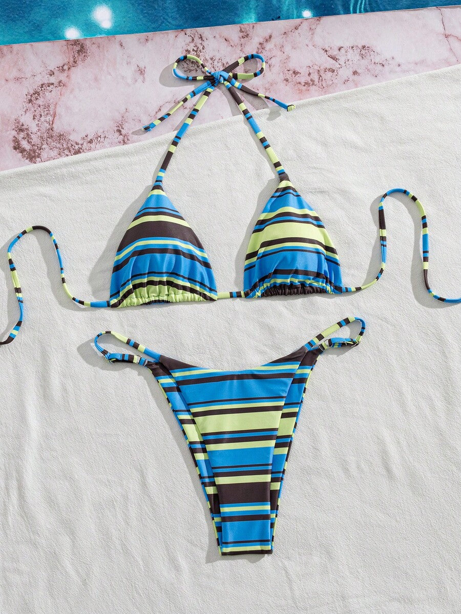 Women's printed halter neck tie two-piece swimwear featuring a wireless triangle top with removable padding and high-waist high-cut bikini bottoms.