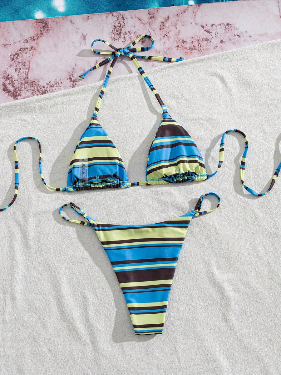 Women's printed halter neck tie two-piece swimwear featuring a wireless triangle top with removable padding and high-waist high-cut bikini bottoms.