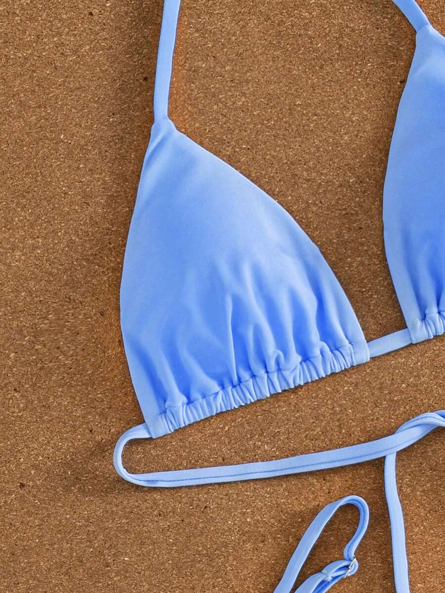 Women's printed halter neck tie two-piece swimwear featuring a wireless triangle top with removable padding and high-waist high-cut bikini bottoms.