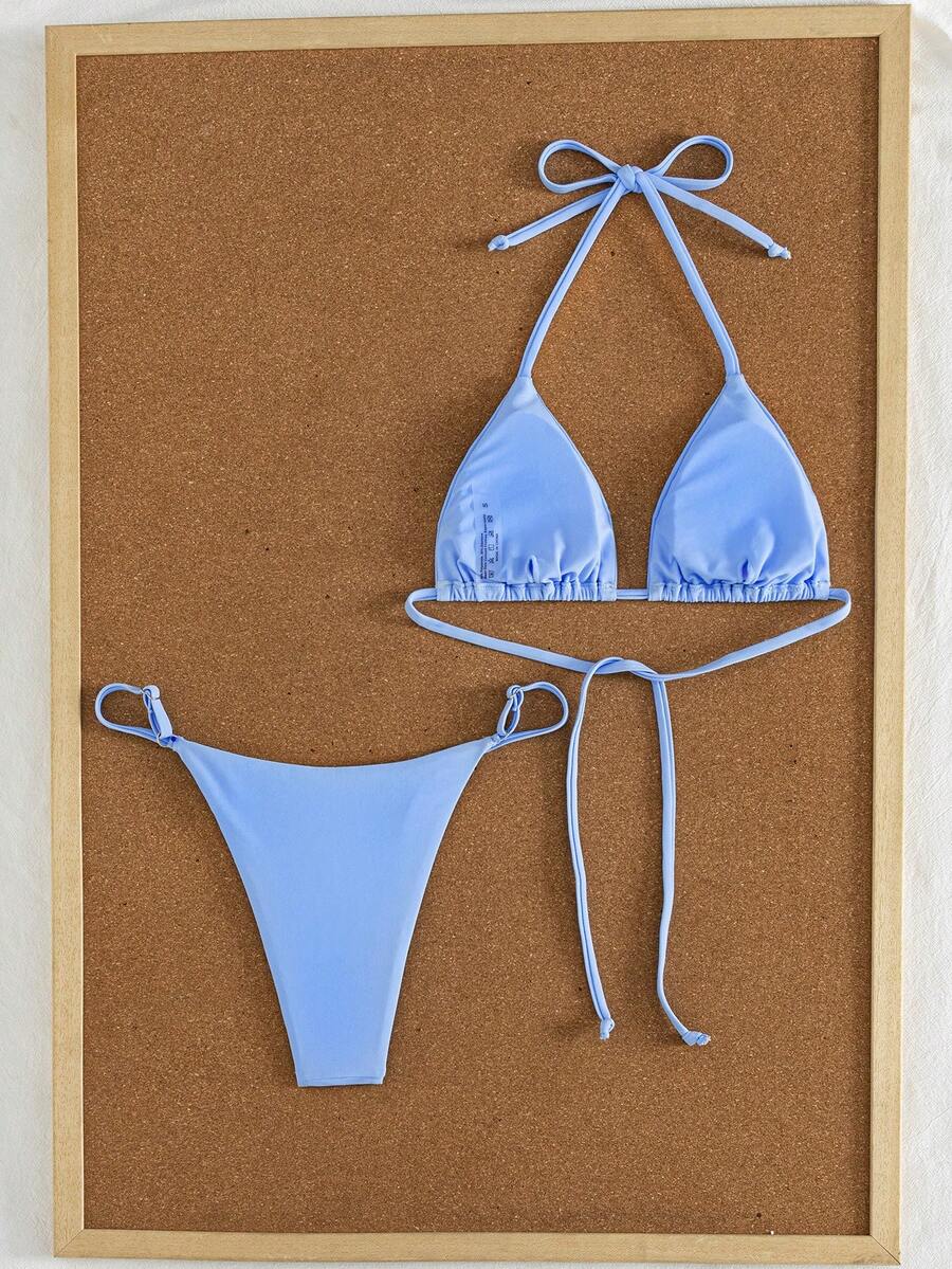 Women's printed halter neck tie two-piece swimwear featuring a wireless triangle top with removable padding and high-waist high-cut bikini bottoms.