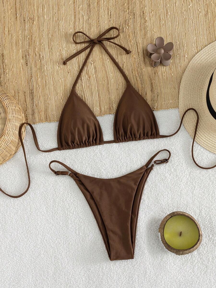 Women's printed halter neck tie two-piece swimwear featuring a wireless triangle top with removable padding and high-waist high-cut bikini bottoms.