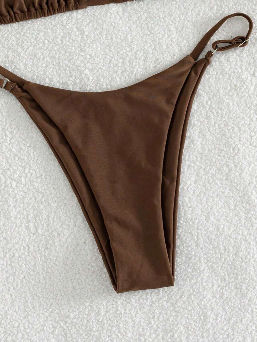 Women's printed halter neck tie two-piece swimwear featuring a wireless triangle top with removable padding and high-waist high-cut bikini bottoms.