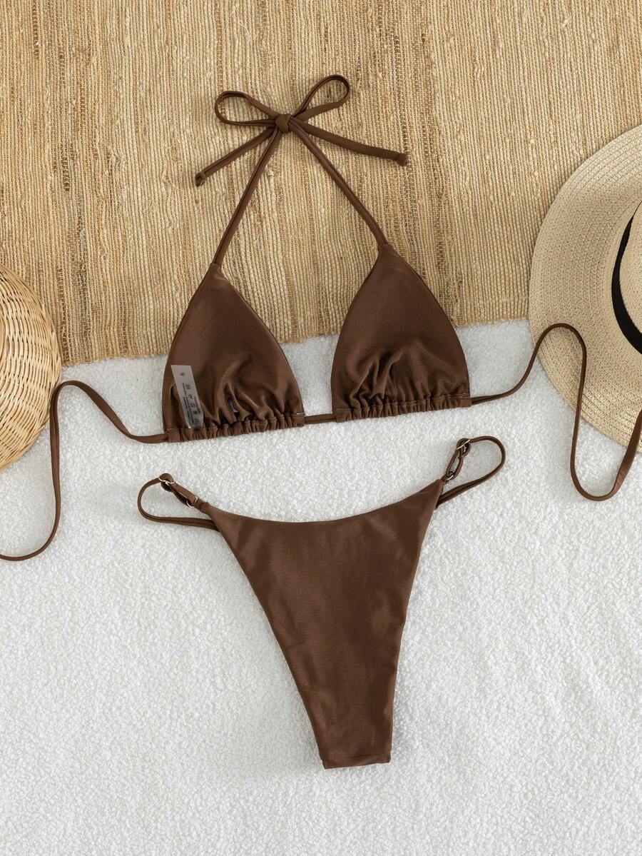 Women's printed halter neck tie two-piece swimwear featuring a wireless triangle top with removable padding and high-waist high-cut bikini bottoms.