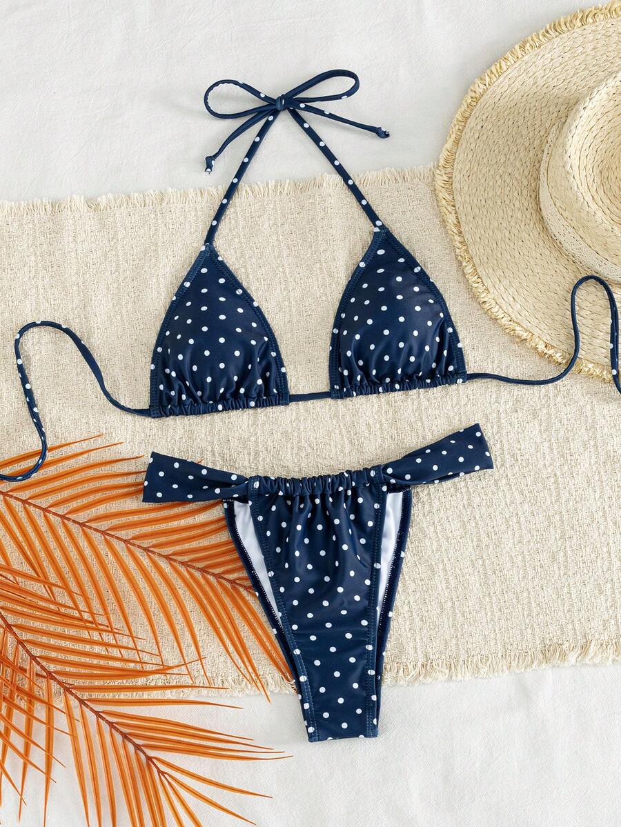 Women's striped halter two-piece swimsuit featuring a lace-up triangle top with removable padding and high-cut low-waist bikini bottoms.
