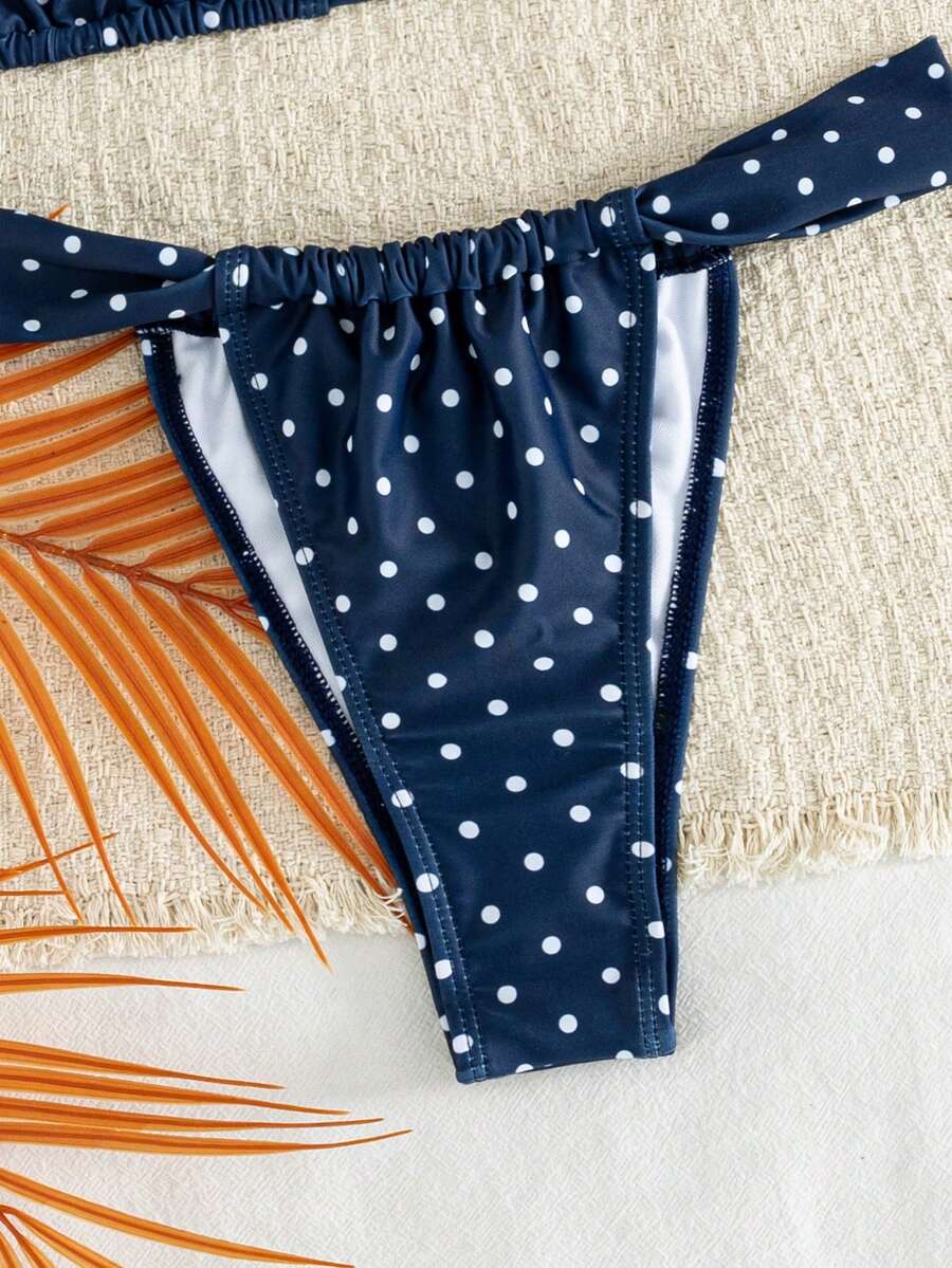 Women's striped halter two-piece swimsuit featuring a lace-up triangle top with removable padding and high-cut low-waist bikini bottoms.