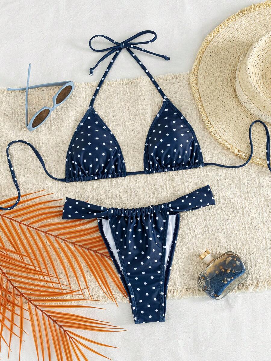 Women's striped halter two-piece swimsuit featuring a lace-up triangle top with removable padding and high-cut low-waist bikini bottoms.