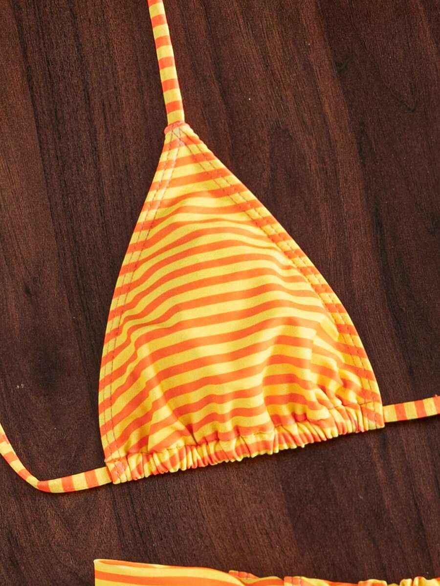 Women's striped halter two-piece swimsuit featuring a lace-up triangle top with removable padding and high-cut low-waist bikini bottoms.