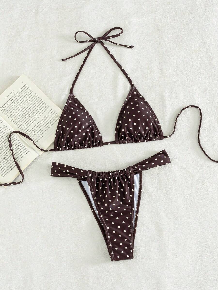 Women's striped halter two-piece swimsuit featuring a lace-up triangle top with removable padding and high-cut low-waist bikini bottoms.