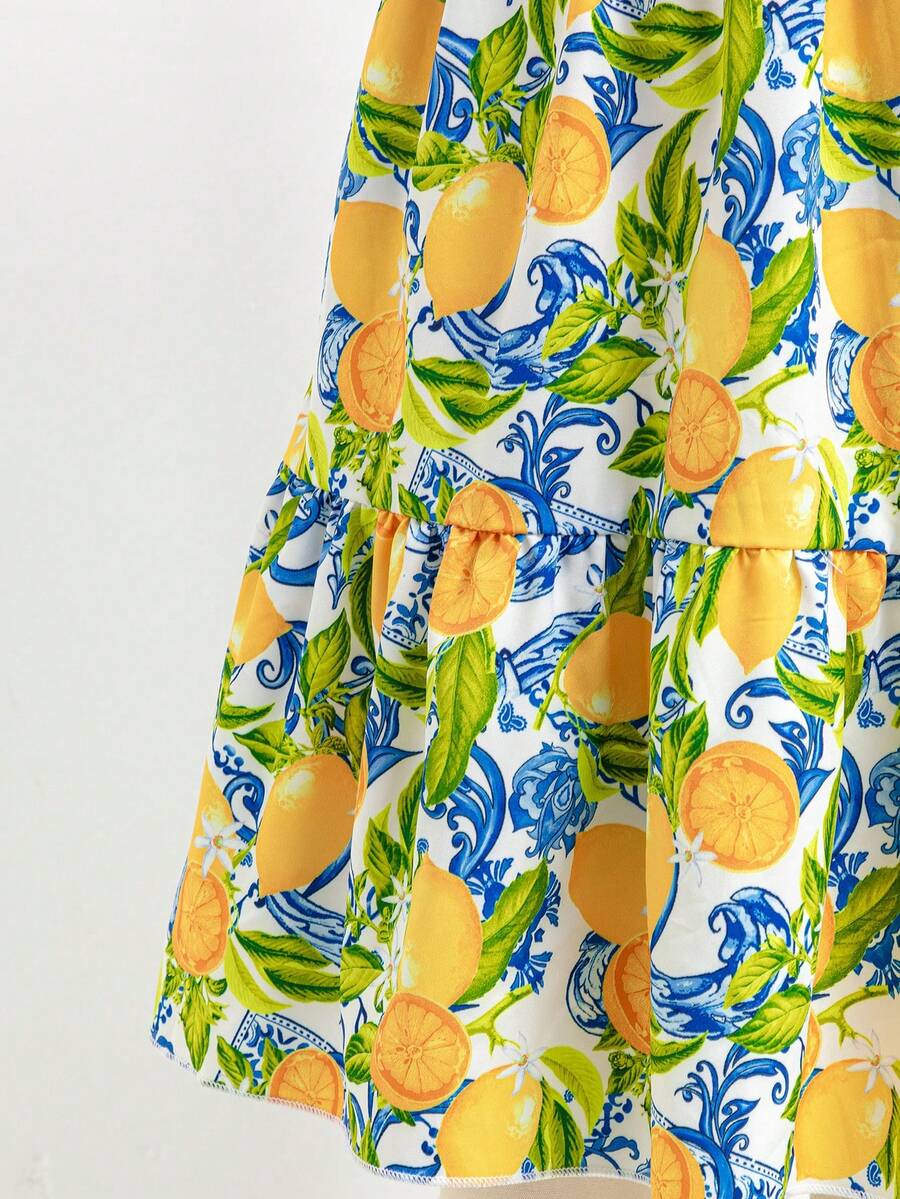 Tween girl blue plant print spaghetti strap cami dress with shirred high waist and flounce ruffled hem