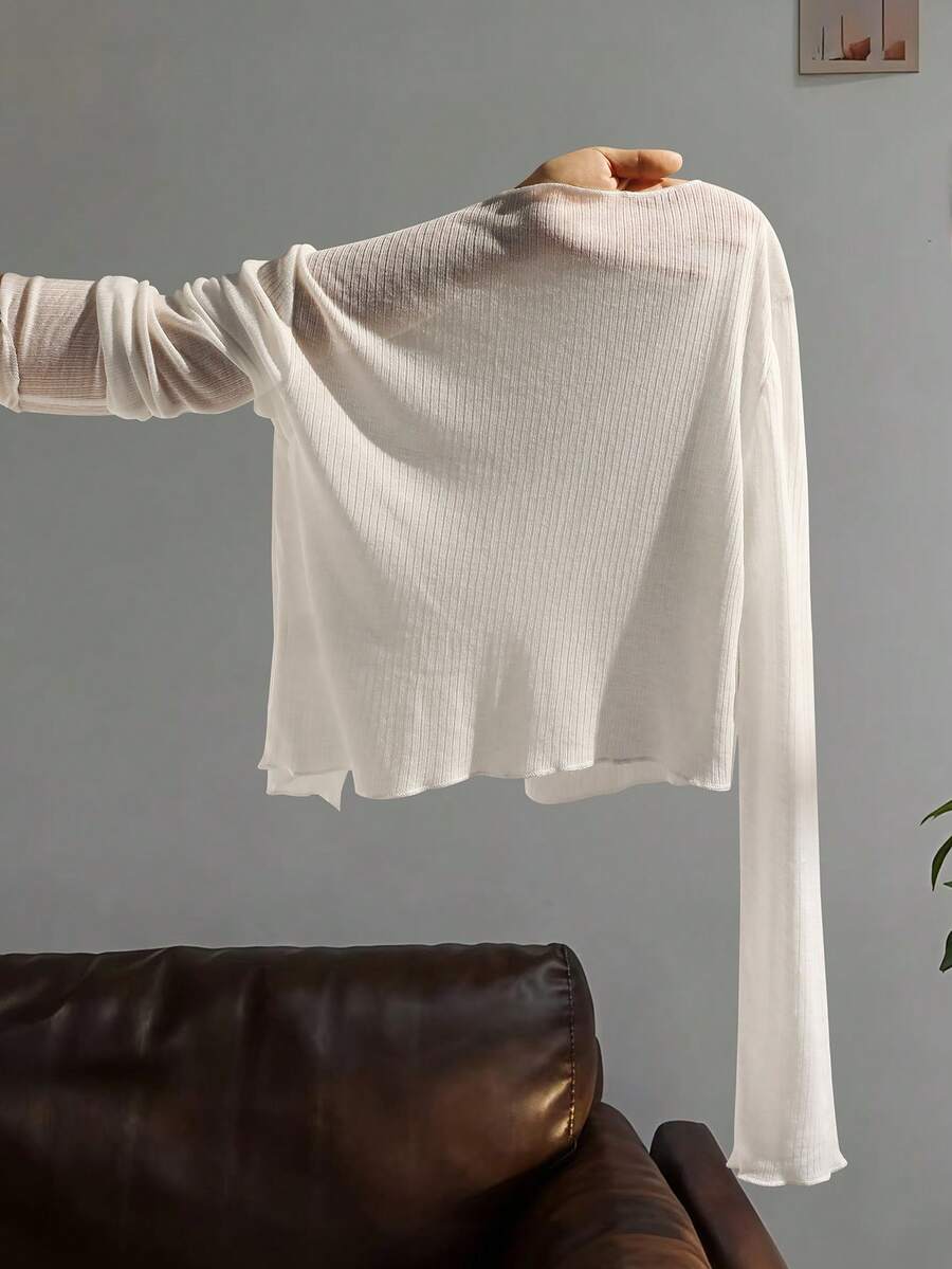 Tween girls white long sleeve V-neck cardigan top featuring asymmetrical front buttons.