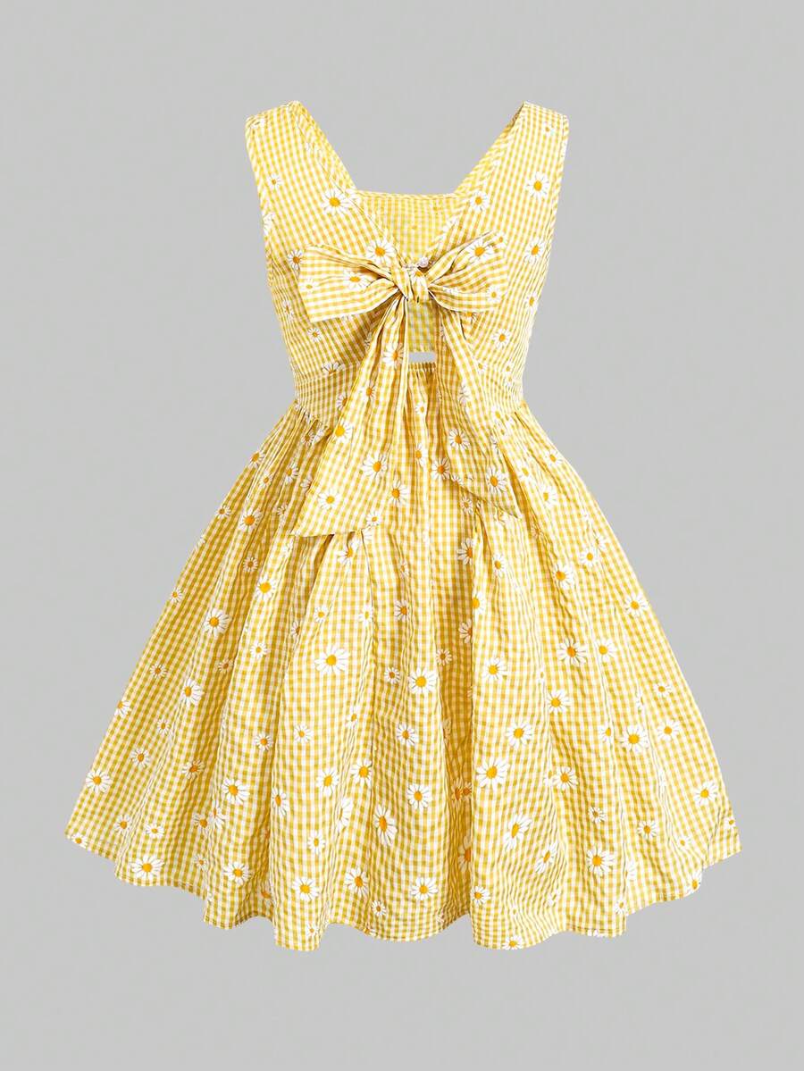 Black and white polka dot sleeveless A-line dress for tween girls featuring a scoop neck, high waist, and flared hem.