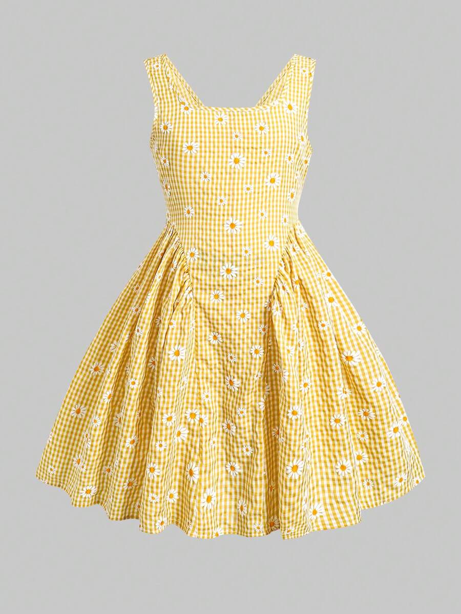 Black and white polka dot sleeveless A-line dress for tween girls featuring a scoop neck, high waist, and flared hem.