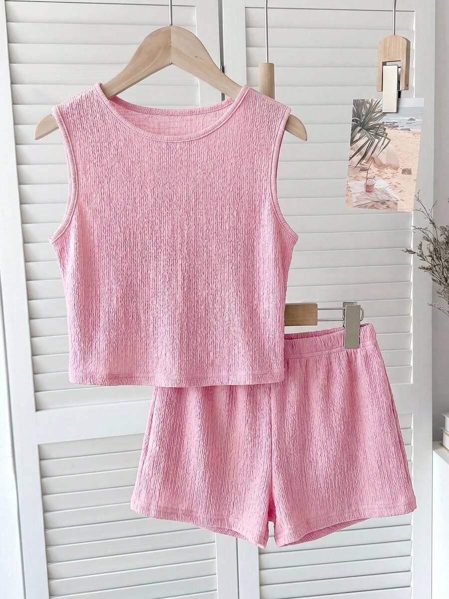 Tween girls black rib-knit round neck slim fit top and textured shorts casual summer set.