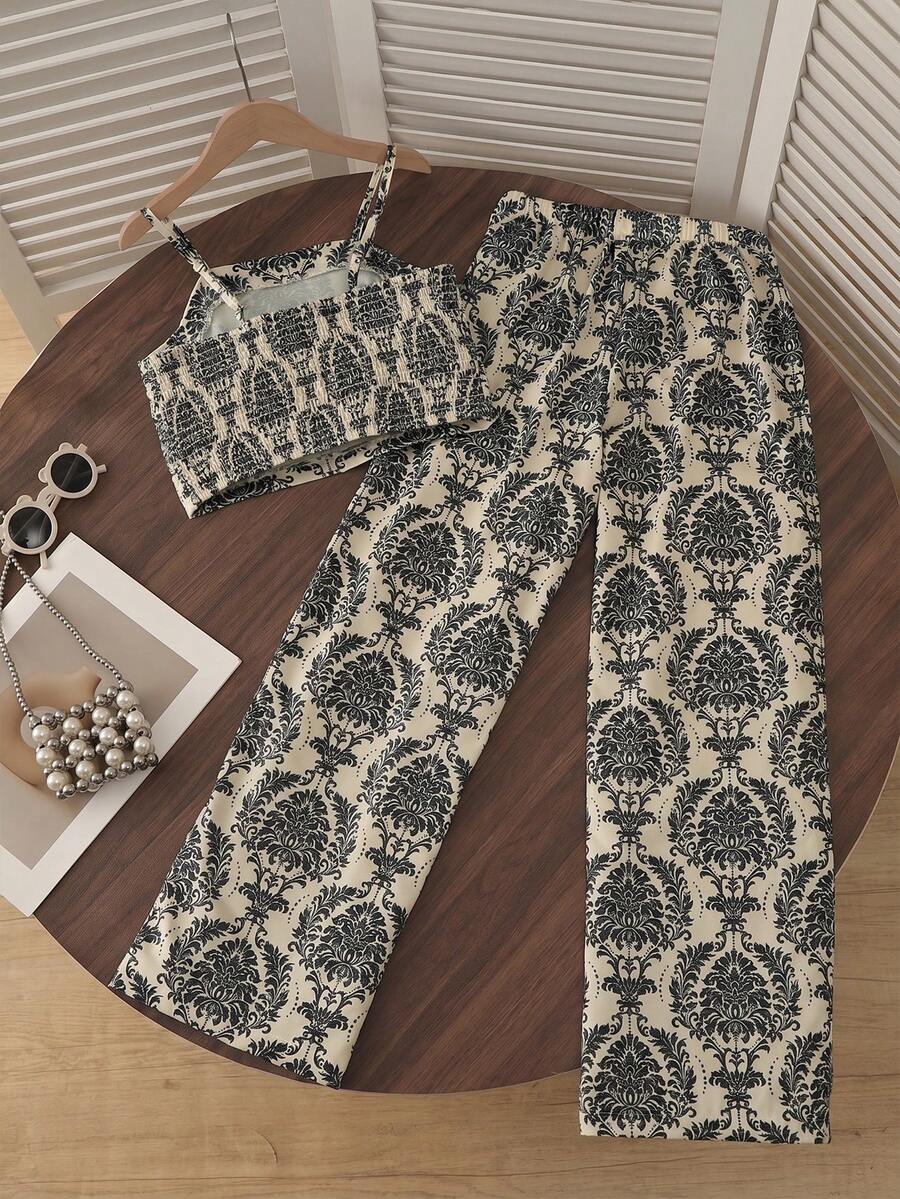 Tween girls casual 2-piece set featuring an apricot woven camisole crop top with back shirring and matching high-waisted loose long pants.