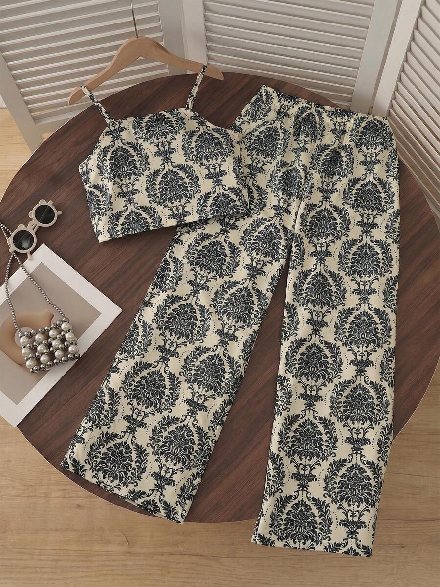 Tween girls casual 2-piece set featuring an apricot woven camisole crop top with back shirring and matching high-waisted loose long pants.
