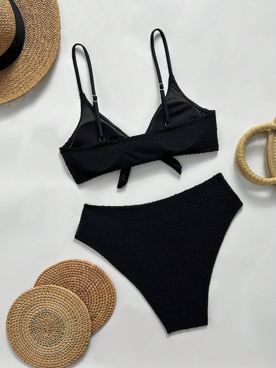 Women's black 2-piece high waist bikini swimsuit set featuring spaghetti straps, criss-cross knot details, wireless bra with removable padding, and high-stretch fabric.