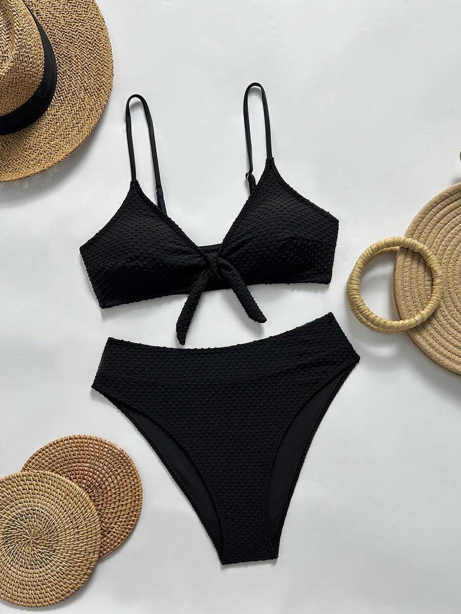 Women's black 2-piece high waist bikini swimsuit set featuring spaghetti straps, criss-cross knot details, wireless bra with removable padding, and high-stretch fabric.