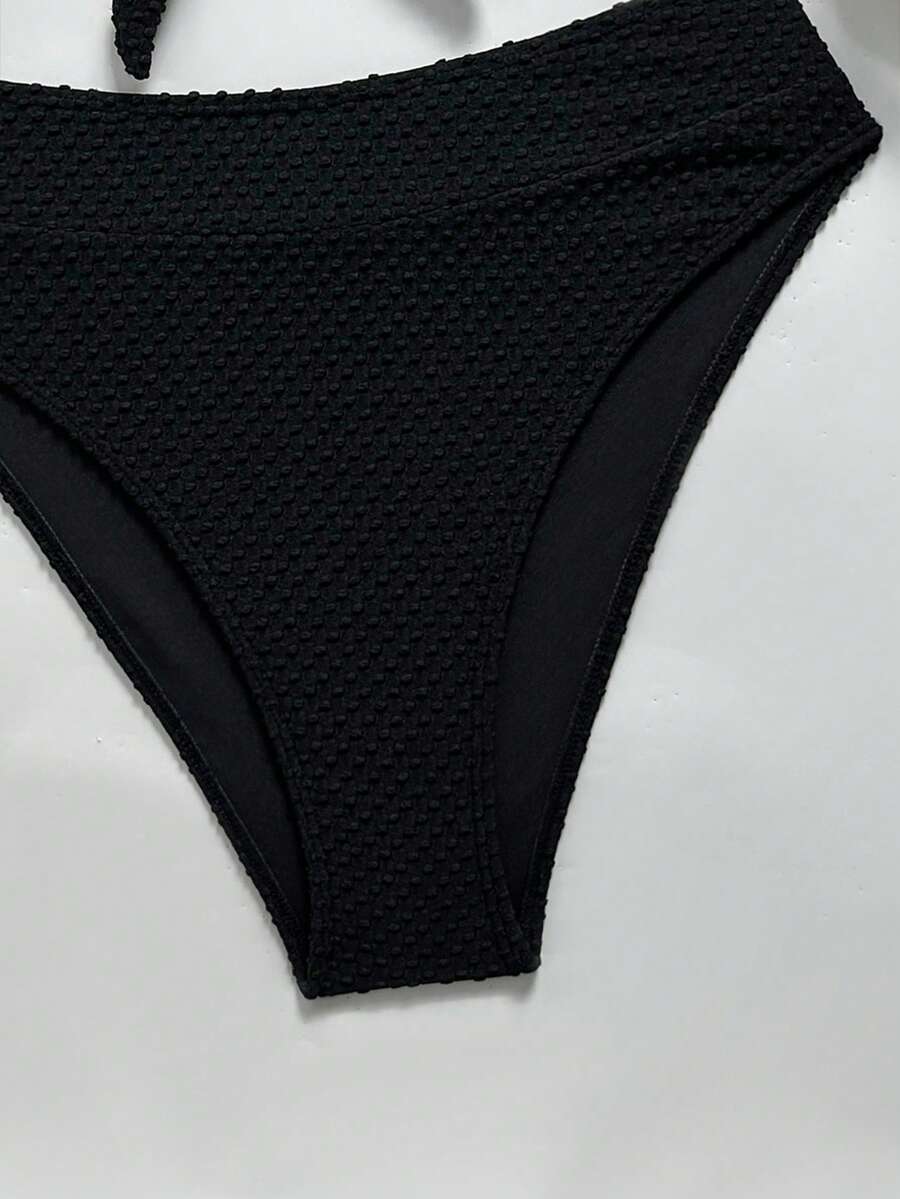 Women's black 2-piece high waist bikini swimsuit set featuring spaghetti straps, criss-cross knot details, wireless bra with removable padding, and high-stretch fabric.