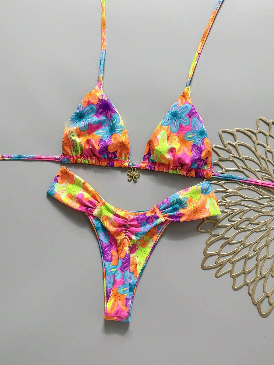 Women's 2-piece triangle cup bikini set in solid color featuring woven pearl shell decoration, halter neckline, and high-waist side-tie ruched bottoms.