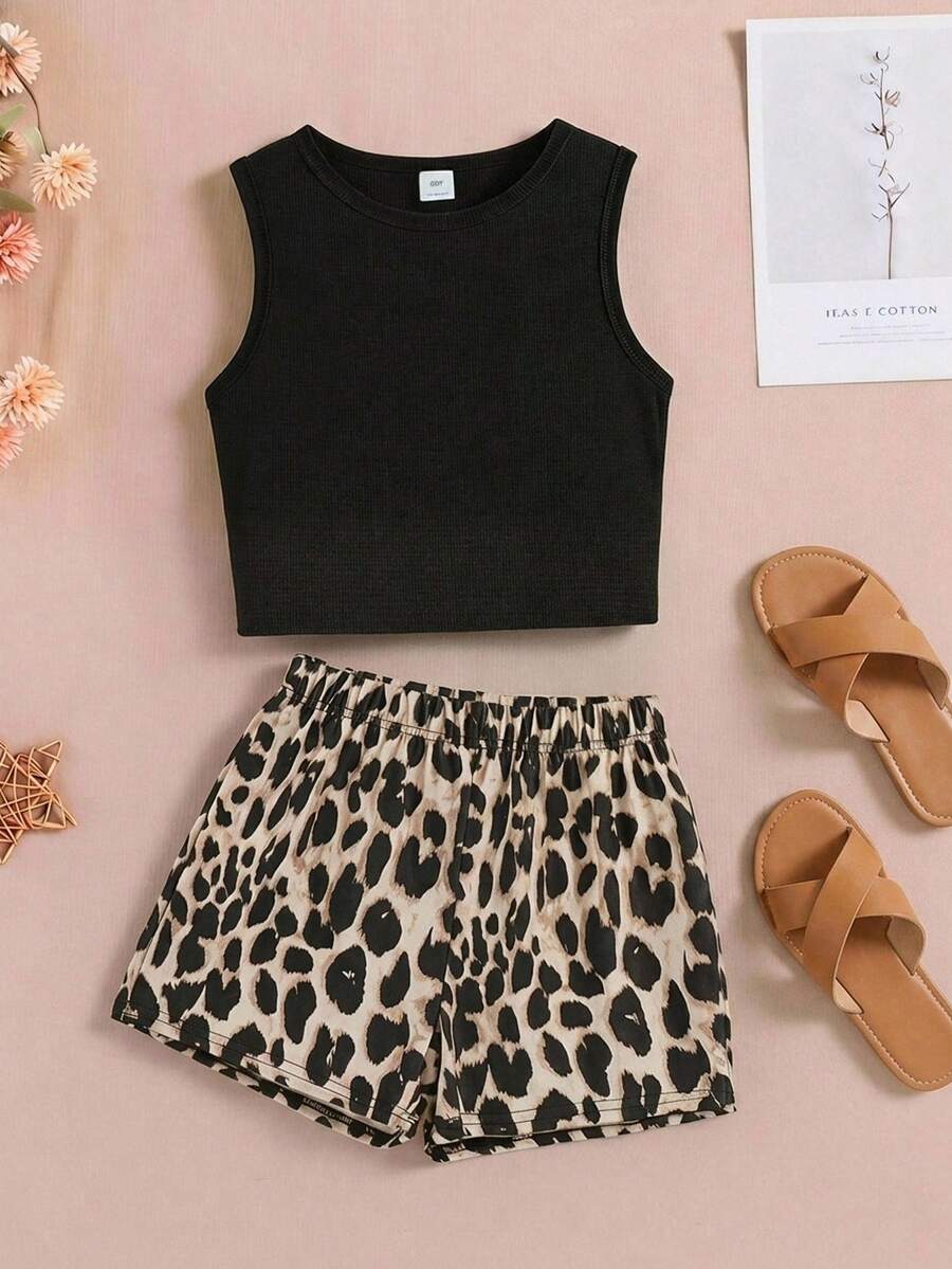 Tween girls black rib-knit round neck slim fit top and textured shorts casual summer set.