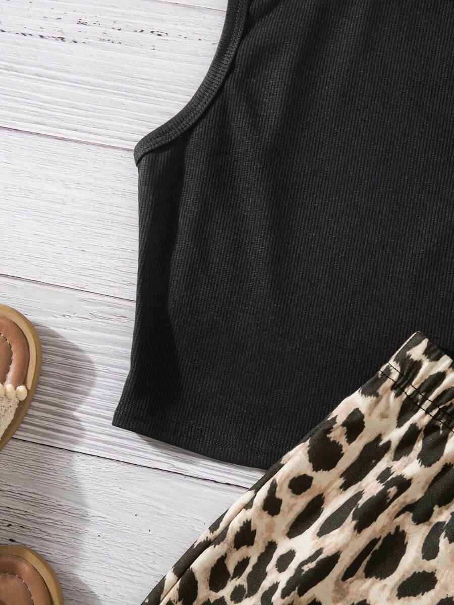 Tween girls black rib-knit round neck slim fit top and textured shorts casual summer set.