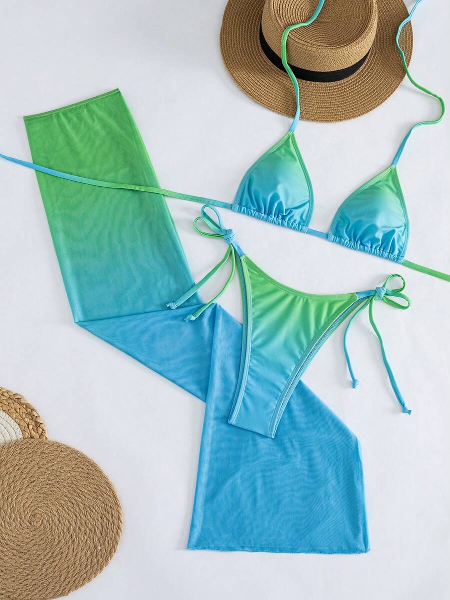 Women's 3-piece gradient bikini set featuring a green halter tie top with removable padding, low waist bottoms, and a matching sheer mesh skirt.