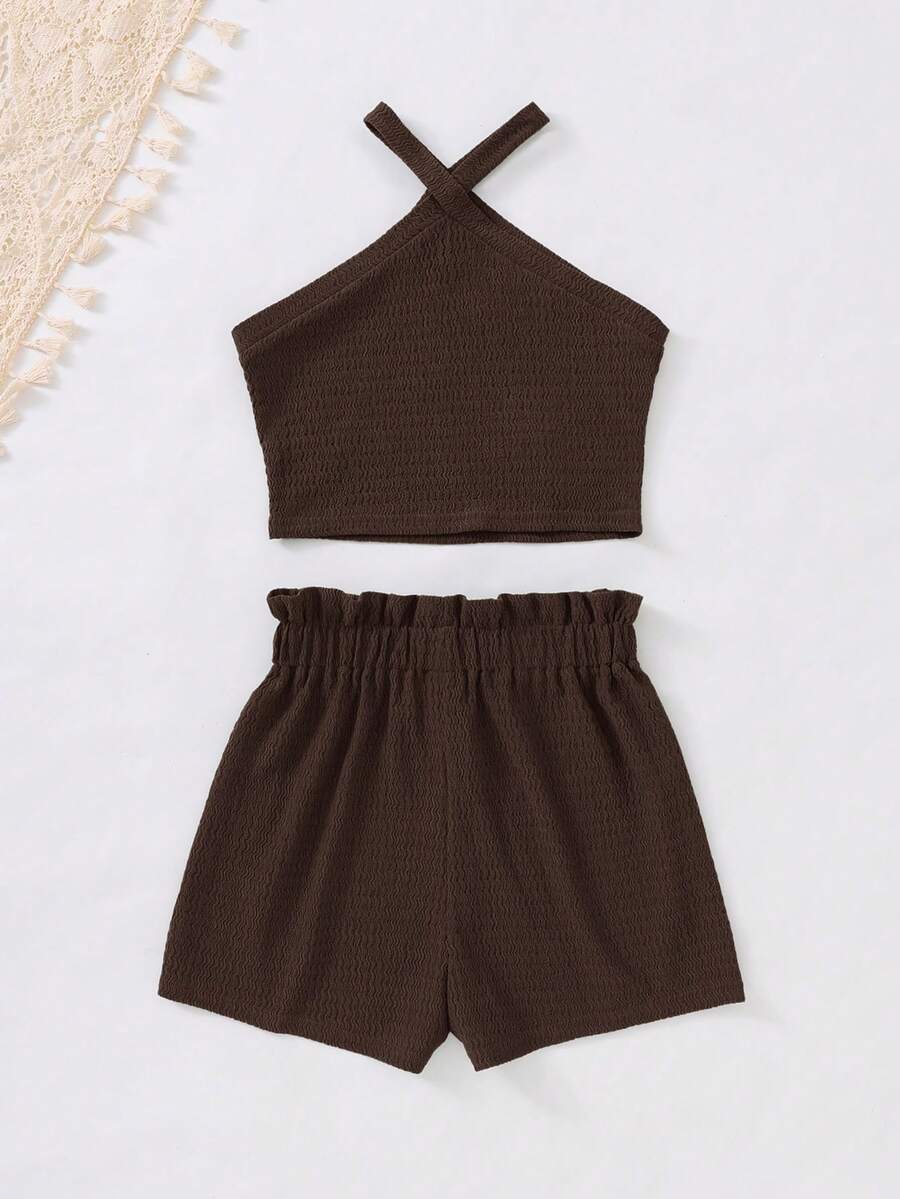 Tween girl 2-piece casual outfit set featuring a solid beige knit halter sleeveless top with belted detail and matching shorts.