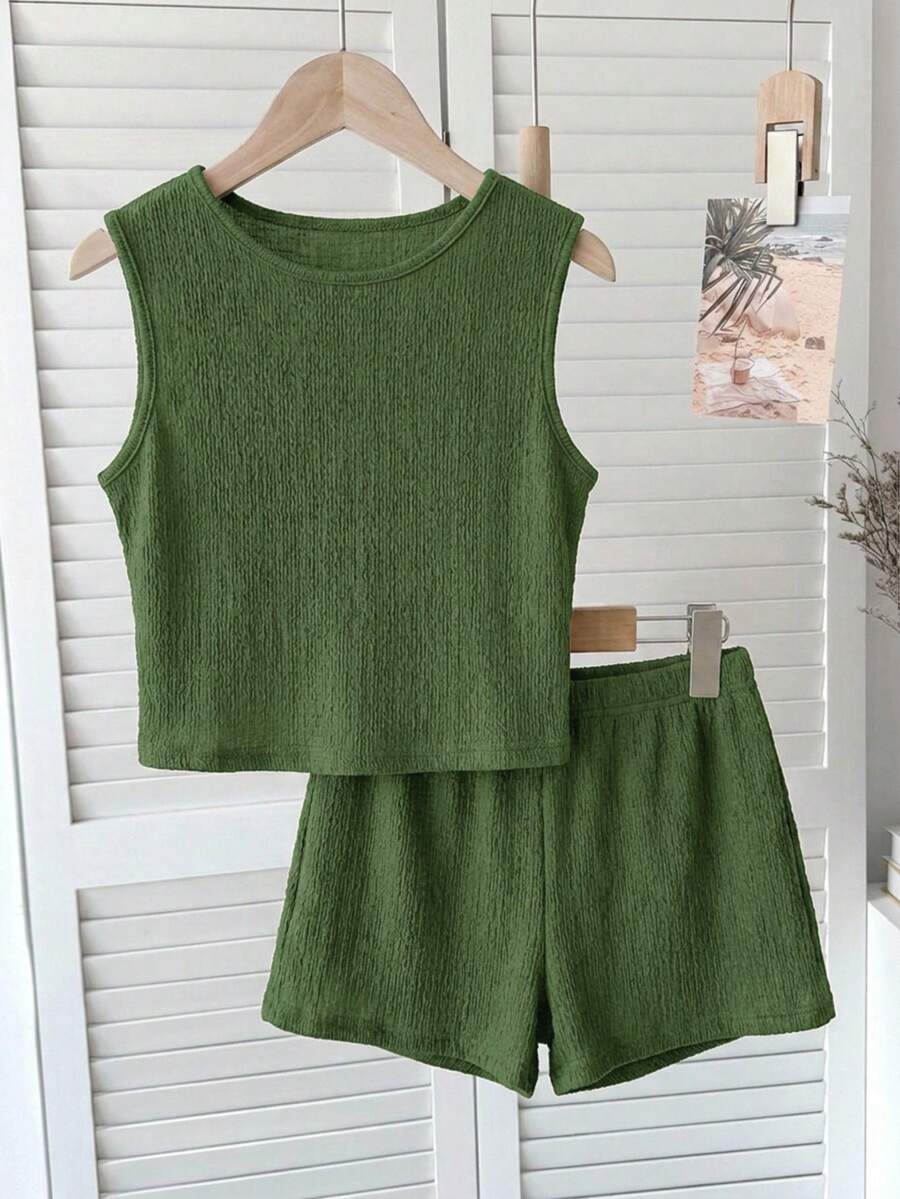 Tween girls black rib-knit round neck slim fit top and textured shorts casual summer set.