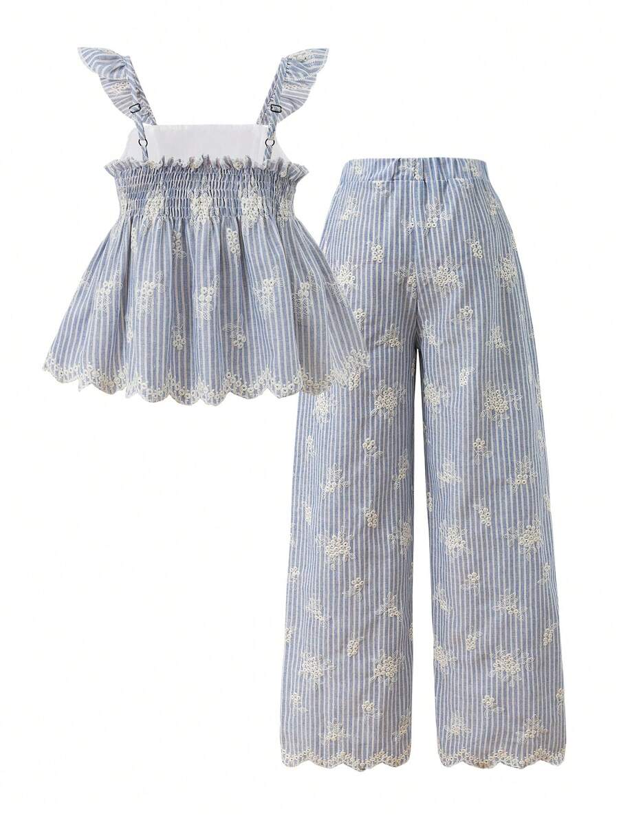 Tween girl wearing an apricot 2-piece outfit set featuring a shirred spaghetti strap short cami top and matching wide-leg long pants.