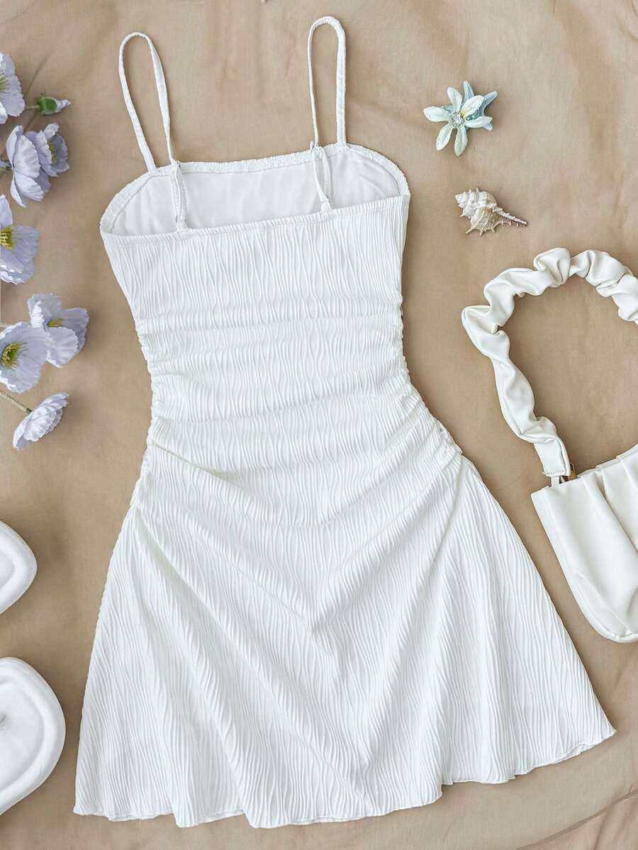 Apricot tween girls sleeveless halter cami dress with appliques, bow front, zipper detail, high waist, flared hem, and short slim fit design.