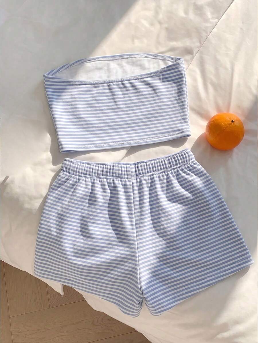 Tween girls two-piece summer outfit featuring a brown strapless tube top with contrast pink tape accent and matching brown shorts with pockets.