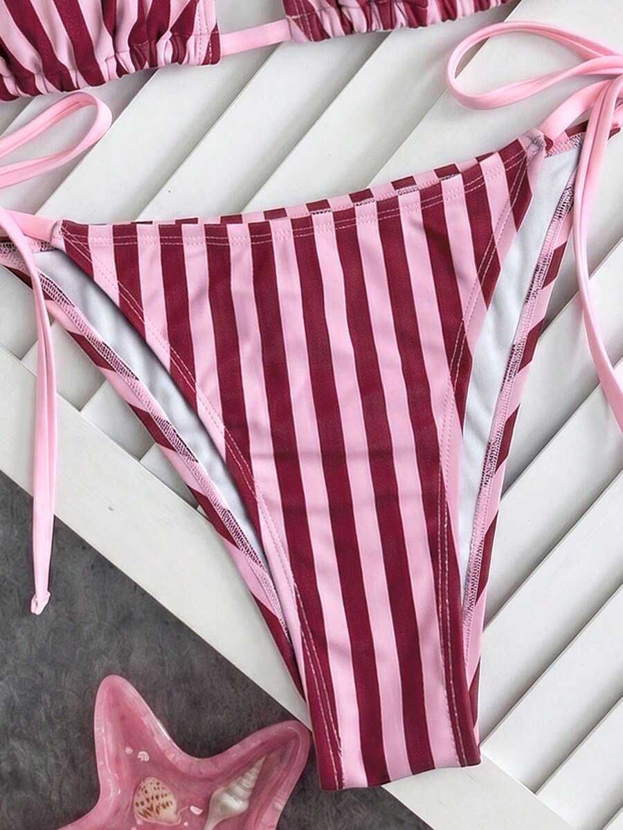 Women's high waist 2-piece triangle bikini set featuring colorblock trim, halter neckline, wireless bra with removable padding, and tie-side bottoms.
