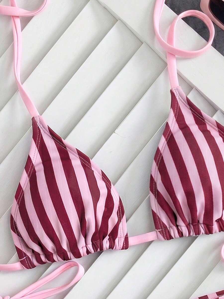 Women's high waist 2-piece triangle bikini set featuring colorblock trim, halter neckline, wireless bra with removable padding, and tie-side bottoms.