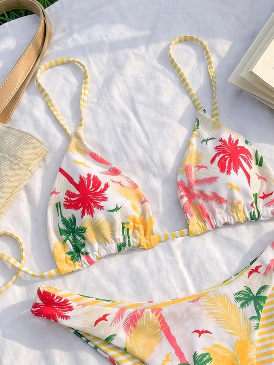 Women's two-piece halter bikini set featuring high cut thong bottoms and removable padding