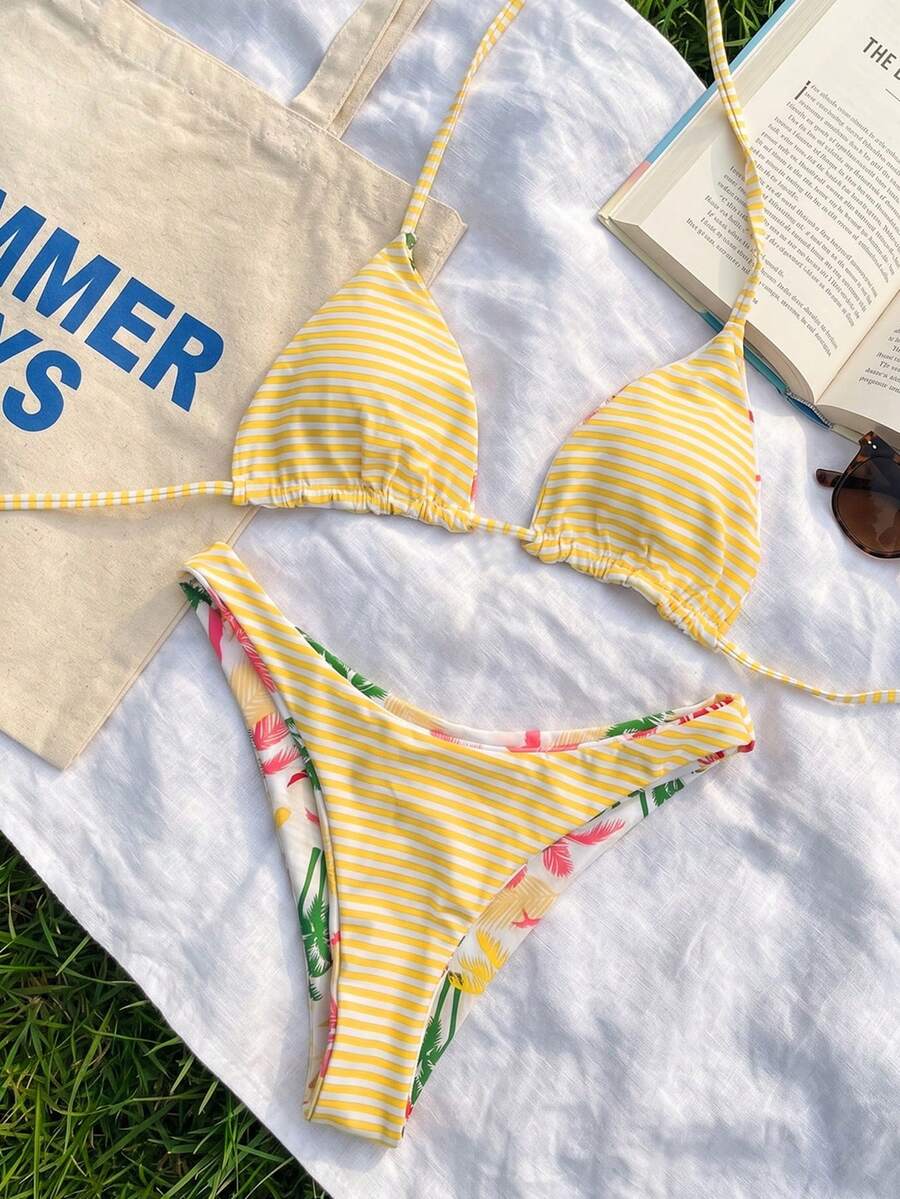 Women's two-piece halter bikini set featuring high cut thong bottoms and removable padding