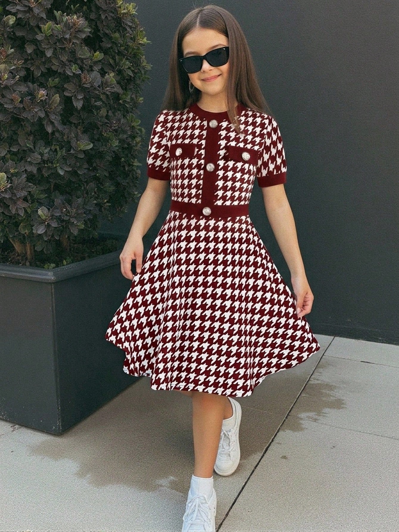 Nova Glow tween girls black and white houndstooth print short sleeve A-line dress with decorative buttons and crew neckline.