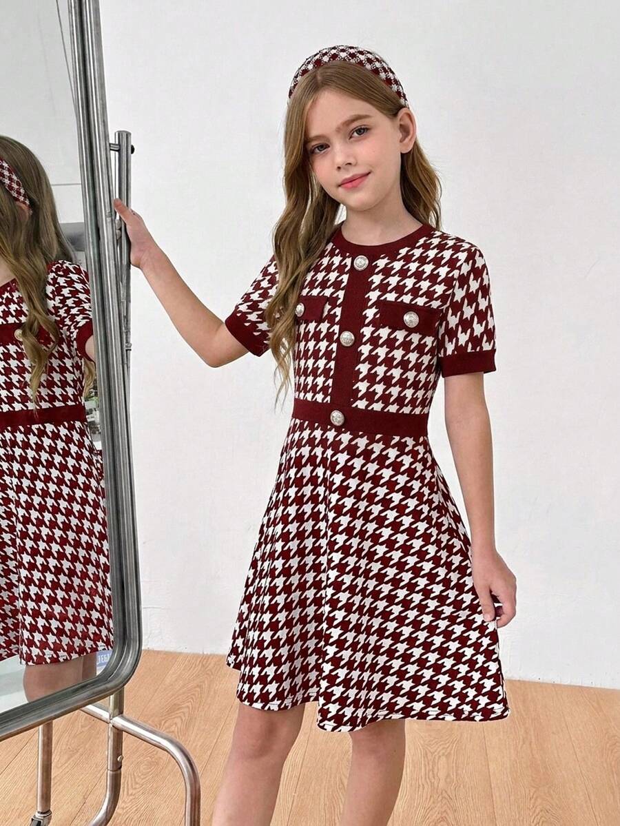Nova Glow tween girls black and white houndstooth print short sleeve A-line dress with decorative buttons and crew neckline.