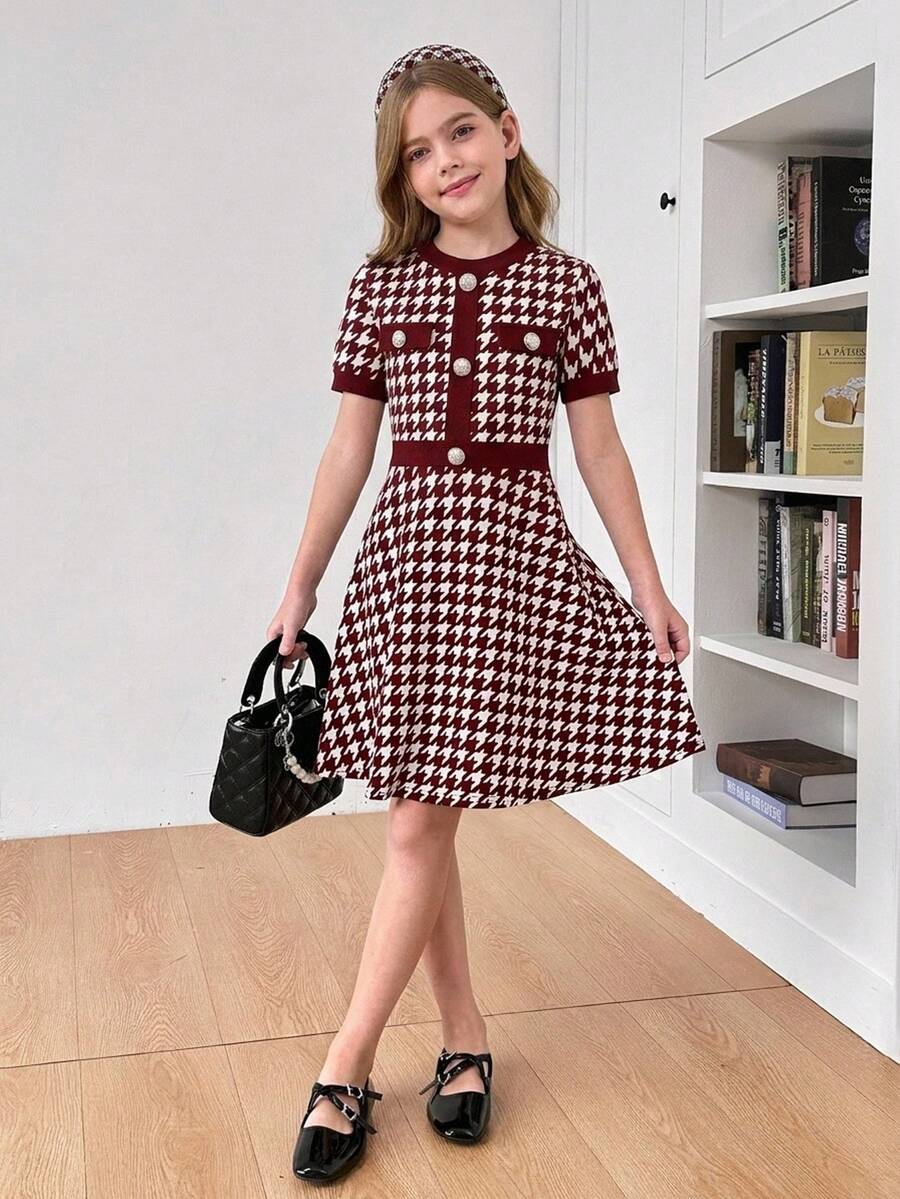 Nova Glow tween girls black and white houndstooth print short sleeve A-line dress with decorative buttons and crew neckline.