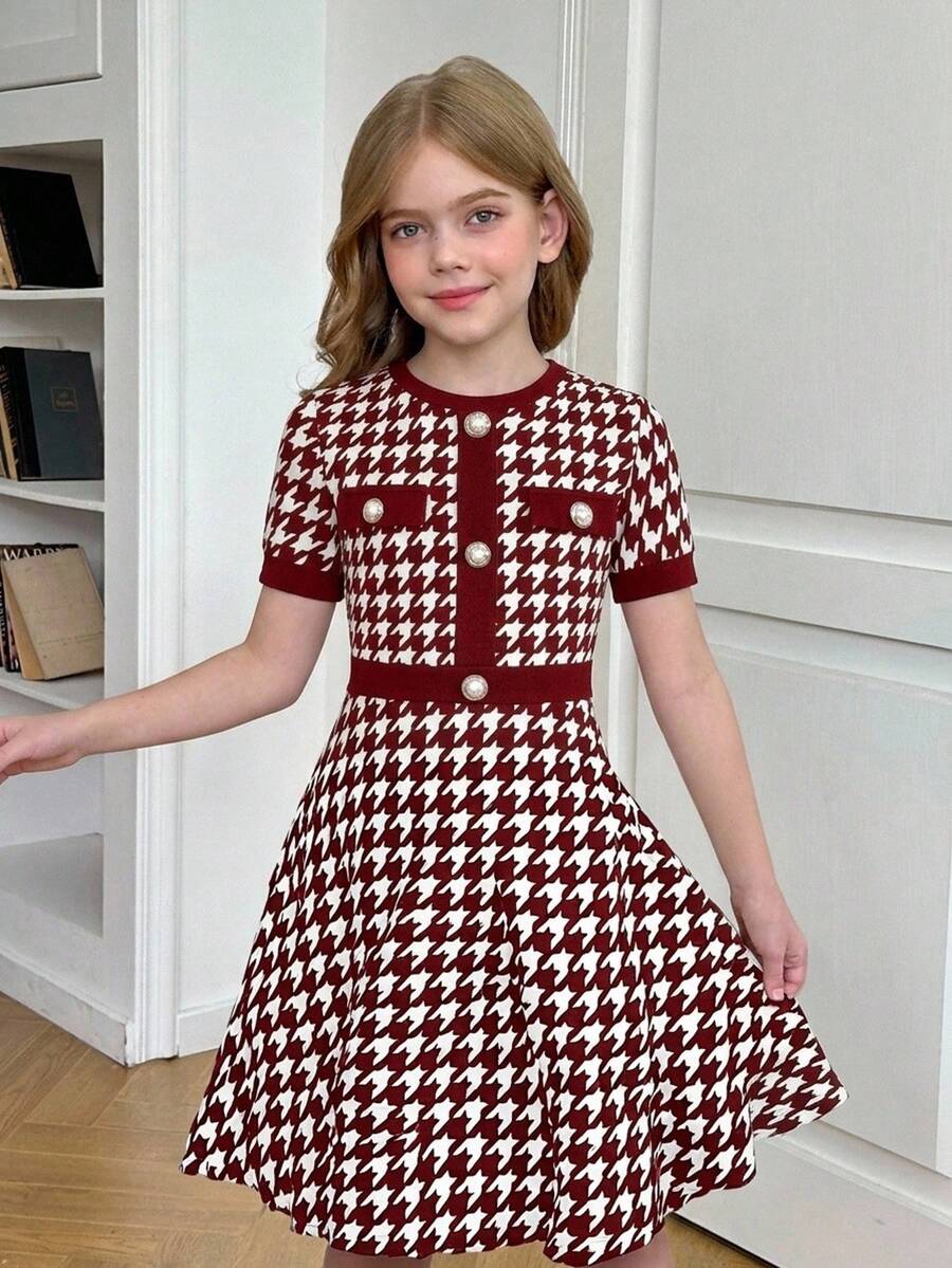 Nova Glow tween girls black and white houndstooth print short sleeve A-line dress with decorative buttons and crew neckline.