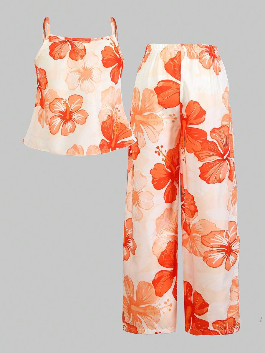 Tween girl wearing an apricot 2-piece outfit set featuring a shirred spaghetti strap short cami top and matching wide-leg long pants.