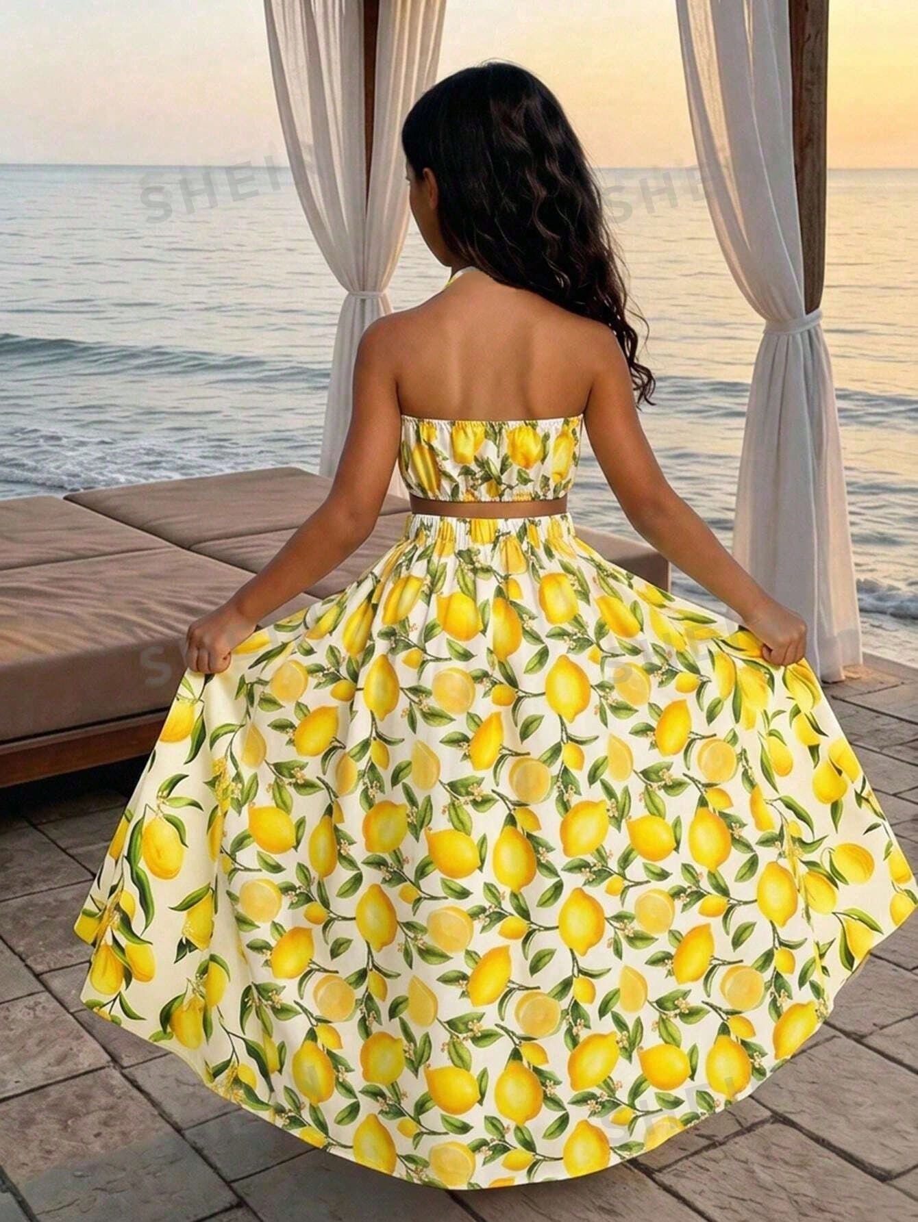 Tween girls floral halter dress with backless sleeveless design, belted high waist, shirred details, appliques, and flared A-line midi silhouette for summer vacation or graduation outfit.